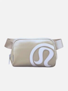 lululemon beige and white logo crossbody belt bag